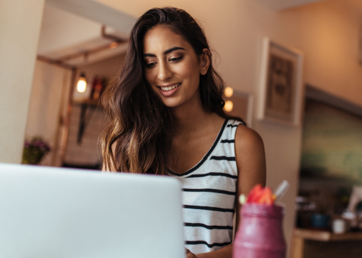 woman at her laptop at home